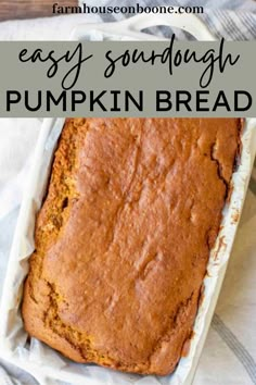 a loaf of pumpkin bread in a pan with the words easy sourdough pumpkin bread