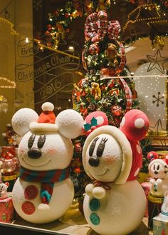 mickey and minnie mouse christmas decorations on display