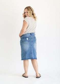 The Tiana Distressed Denim Midi Skirt is a modest and cute denim midi skirt! Designed with backed distressing at the front and back pockets, an uneven raw hem, 5 pockets for holding all the things, and a classic button zipper closure. Style: distressed, denim, midi length Color: Denim Quality control is of the utmost importance to us. Our sizing is always approximate and can also depend heavily on your own body shape. Just like no two people are the same, the same goes for skirts, dresses + tops Spring Capsule Wardrobe, Curvy Women Jeans, Denim Midi Skirt, Two People, Staple Pieces, Body Shape, Quality Control, Distressed Denim, The Things