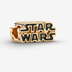 Brand New With Tags Authentic Star Wars Shining 3d Logo Pandora Charm Get Three Charms For 30.00 Show Your Love For Star Wars With The Star Wars Shining 3d Logo Charm. Hand-Finished In 14k Gold-Plated Unique Metal Blend, This Piece Features Hand-Applied Black Enamel Details To Highlight Each Letter. There Are Also Cut-Out Stars On The Sides Of The Charm To Make For The Ultimate Symbol Of The Star Wars Universe. Wear This Piece On Your Go-To Bracelet With Other Star Wars Charms To Secure Your Pla Star Wars Earrings, Pandora Star, Pandora Charms Disney, Star Wars Jewelry, Pandora Original, Disney Charms, Pandora Disney, 3d Star, Star Wars Women