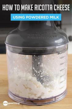 how to make ricotta cheese using powdered milk in a food processor with text overlay