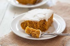 a piece of cake on a plate with a fork