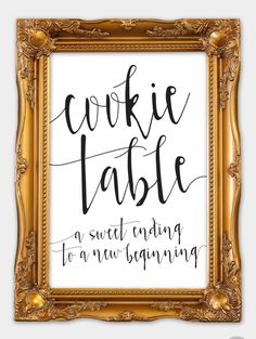 an ornate gold frame with the words cookie table in black and white lettering on it