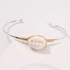 Cowrie Cowry Seashell Shell Pearl Lined Crevice Ocean Mermaid Sea Gold Wire Wrapped Silver Adjustable Bangle Bracelet. Mermaid Chic! New. If You Want It, Don’t Let It Get Away Send Me An Offer! I Love To Do Bundle Order Discounts! Elegant White Bracelets For Vacation, Elegant White Jewelry For Beach Season, Shell Bracelets For Summer, Ocean Mermaid, Adjustable Bangle Bracelet, Silver Mermaid, Adjustable Bangle, Cowrie Shell, Gold Wire