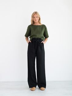 "JULIET is a wide leg linen paper bag pants. DETAILS - Wide leg - Elastic waist - High waist - Bow detail at front - Large pockets - 100% lightweight European linen fabric - Cut and sewn to order just for you in our studio COLOR - Black, you can also choose other colors above - Fabric samples are available here https://www.etsy.com/listing/586569696/linen-fabric-samples SIZING & FIT - Fits true to size - Full length is approximately 44 inches / 112 cm - Inseam is approximately 30.5 inches / Wide Leg Linen Pants Outfit, Wide Leg Black Pants Outfit, Black Wide Leg Pants Outfit, Black Linen Trousers, Black Pants Outfit, Wide Leg Linen Trousers, Paper Bag Waist Pants