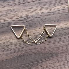 ♥Simply♥Dainty♥Everyday♥Minimal♥ 14k gold filled 14k Rose Gold filled 925 sterling silver Triangle gauge: 24 gauge/0.5mm 22 gauge/0.64mm 20 gauge/0.8mm Triangle inner dimensions: 8x8mm ---------------------------------------------------------- 14k gold filled Anyone who can wear gold can wear gold filled without worries of any allergic reaction to the jewelry. Gold filled jewelry is an economical alternative to solid gold! ---------------------------------------------------------- 100% handmade Industrial Earrings, Earring Piercing, Double Chain, Triangle Earrings, Gold Filled Jewelry, Piercing Jewelry, Gold Rose, Or Rose, Solid Gold