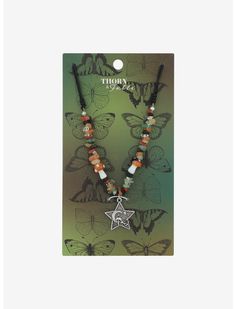 Thorn & Fable Star Mushroom Cord Necklace | Hot Topic Bohemian Star Charm Necklace For Festivals, Adjustable Star-shaped Beaded Necklace Gift, Bohemian Festival Necklaces With Star Charm, Bohemian Necklace With Star Charm For Festivals, Star Charm Necklace For Festivals, Spiritual Star Charm Necklaces, Adjustable Star Charm Festival Jewelry, Adjustable Star Charm Jewelry For Festivals, Haunt Couture