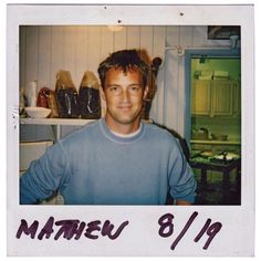 a man standing in front of a kitchen counter