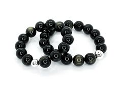 "14mm Golden Obsidian Bracelets  ▸ natural Golden Obsidian 7A ▸ 13-14mm beads ▸ smooth finish ▸ 925 sterling silver  ▸ durable stretch cord   GOLDEN OBSIDIAN  USE FOR: purification, transformation, fulfillment, metamorphoses, manifestation, practicality, psychic ability, protection CHAKRA: base ELEMENT: earth + fire ZODIAC: Sagittarius + Scorpio MANTRA: I am inspired and inspiring. Obsidian is truth-enhancing.  A strongly protective stone, it forms a shield against negativity.  It blocks psychic attacks and absorbs negative energies from the environment.  Obsidian draws out mental stress and tension.  It stimulates growth on all levels, urging exploration of the unknown and opening new horizons.  Brings clarity to the mind and clears confusion.  Helps you to know who you truly are.  Obsidi Obsidian Round Beads Jewelry 8mm, Obsidian Bracelets, Fire Zodiac, Golden Obsidian, Sagittarius Scorpio, Psychic Ability, Element Earth, Obsidian Bracelet, Gemstone Properties