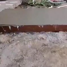 a concrete slab is laying on the ground