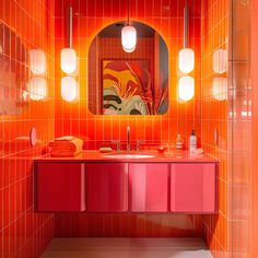 Funky 70s bathroom with tangerine tango tiles and dazzling fuchsia vanity 1970s Bathroom Vintage, 70s Interior Color Palette, Primary Color Bathroom, Colored Tile Bathroom, Red Bathroom Vanity, Interior Design 1970s, Retro Color Palette 1970s, Retro Tile Bathroom, Colorful Room Ideas