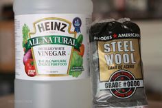 two bottles of heinz's all natural and steel wool are sitting next to each other