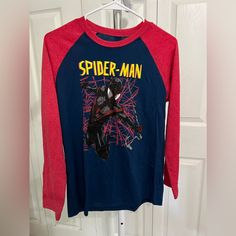 New With Tags From Marvel. Long Sleeve Spider-Man T Shirt. Boys Size Large. Smoke Free And Pet Free Home 5 For $25 Sale How It Works: Only Items That Say “5/$25” In The Listing Are Included. Choose Any 5 Items That Are Listed As 5/$25 And Add Them To A Bundle. Offer $25 And It Will Be Accepted. You Must Have 5 Items To Qualify For The Deal, Fewer Than 5 Items Will Be Sold At The Listed Price. Blue Long Sleeve Top With Character Print, Raglan Long Sleeve, Marvel Shirt, Long Sleeve Tee Shirts, The Deal, Marvel Spiderman, Long Sleeve Tee, Kids Shirts, You Must