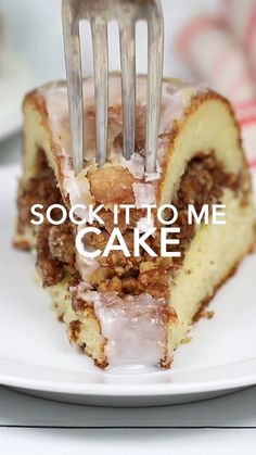 a piece of cake on a plate with a fork stuck in it that says sock to me cake