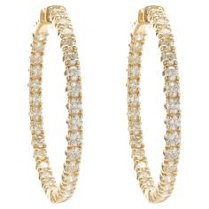 Designer: custom Material: 14K yellow gold Diamond: 64 round brilliant = 6.09cttw Color: G / H Clarity: VS1-2 Dimensions: earrings measure 42.80mm in length Fastenings: post with snap backs Weight: 18.17 grams Diamond Earrings Hoop, Yellow Gold Diamond Earrings, Gold Diamond Hoop Earrings, Gold Diamond Earrings, Inside Outside, Snap Backs, G H, Jewelry Earrings Hoops, Girls Best Friend