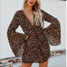 Leopard / Cheetah Print Mini Dress With Bell Sleeves. Small. Bought But Never Worn. Fall Leopard Print V-neck Mini Dress, Leopard Print Long Sleeve Mini Dress For Fall, Long Sleeve Leopard Print Mini Dress For Fall, Brown Long Sleeve Mini Dress For Beach, Leopard Print Dresses For Day Out In Fall, Leopard Print Dress For Day Out In Fall, Leopard Print Dresses For Fall Day Out, Long Sleeve Leopard Print Mini Dress For Summer, Fall Date Night Leopard Print Mini Dress