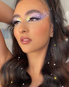 Elevate your festival style with these stunning makeup looks, perfect for any music event or rave. From purple glitter eyes to rhinestone accents, these 30 creative ideas will have you looking your best under the festival lights. Wedding Fairy Makeup, Glitter Holiday Makeup, Festival Makeup Looks, Edc Makeup, 3d Makeup, Coachella Makeup, Modeling Makeup, Pink Concert