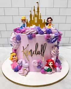 there is a cake with little mermaids on it and the name kadalf