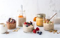 four jars filled with different types of food