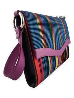 This handcrafted shoulder bag by Kuskaya is joyfully bright and playful. What makes it special is that it is a one-of-a-kind creation and incorporates handwoven textiles created using centuries-old techniques. With a classic and sleek silhouette, it’s a piece that is durable and can last a lifetime. A wonderful gift for any handbag lover - including yourself. Product Details: Composition: 100% Mercerized Pima Cotton & Leather Trim Fabric Hand-Woven on Wooden Looms using centuries-old techniq Formal Multicolor Shoulder Bag With Removable Pouch, Designer Satchel Shoulder Bag With Fold Over Clasp, Modern Flap Bag With Leather Handles For Travel, Modern Shoulder Flap Bag With Leather Handles, Modern Crossbody Flap Bag With Leather Handles, Multicolor Tote Shoulder Bag For Formal Occasions, Designer Everyday Clutch With Magnetic Closure, Modern Shoulder Bag With Flap And Top Carry Handle, Modern Shoulder Bag With Fold Over Clasp For Everyday