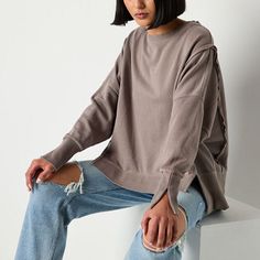 Lounge comfortably in Arizona's oversized sweatshirt from their junior's and women's collection whether at home for a chill day or out with friends. Made from soft cotton French Terry with recycled fabric, this pullover has a crew neckline, long sleeves with split cuffs, and a high-low hem. Pair it with the matching sweatpants for a full look.Closure Type: Pullover HeadFit: Oversized FitNeckline: Crew NeckSleeve Length: Long SleeveSleeve Style: Cuffed SleeveApparel Length: 24 Inches - Front, 25… Large Shirts, Arizona Jeans, Long Sleeve Sweatshirt, Oversized Sweatshirt, Recycled Fabric, Long Sleeve Sweatshirts, Crew Neckline, Women Collection, French Terry