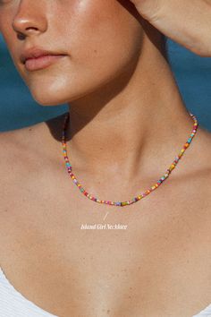 Crafted with full-color glass beads, this choker bursts with the vibrant spirit of island life. It's a celebration of color that will add a lively, tropical twist to your everyday look💫 #summernecklace #atoleajewelry #waterproofjewelry Tropical Twist, Girl Necklace, Island Girl, Island Life, Say Hello, Everyday Look, Choker, Glass Beads, Twist