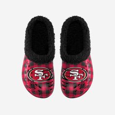 a pair of red and black slippers with the san francisco giants on them