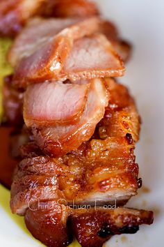 bacon and avocado on a white plate