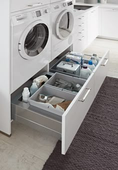 a white washer and dryer in a room