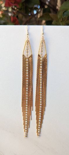 ONE OF A KIND Gold Fringe Earrings - Long Gold Tassel Earrings - Statement Earrings - Rhinestone Chain - Triangle Shaped Gold Jewelry - Xtra Long Fringe - Boho Dangle Gold filled ear wires Stylish, fun, stunning earrings.  Perfect for Vegas, New Years celebrations or a night on the town.  You can wear these lightweight beauties with a vintage tee and jeans or a little black party dress.  Rhinestone chain is made from solid brass, a naturally hypo-allergenic metal, which is electroplated nickel-free.  Tassel - 125x13mm Elegant Dangle Rhinestone Fringe Jewelry, Rhinestone Fringe Drop Earrings For Wedding, Glamorous Gold Tassel Earrings With Rhinestones, Wedding Rhinestone Fringe Drop Earrings, Wedding Drop Earrings With Rhinestone Fringe, Dangle Tassel Earrings With Rhinestones For Evening, Gold Rhinestone Tassel Dangle Earrings, Dangle Rhinestone Fringe Earrings For Weddings, Gold Tassel Dangle Earrings With Rhinestones