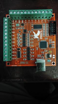 an electronic board with many components attached to it