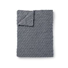 a gray blanket on a white background