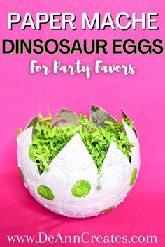 This pin shows a paper mache dinosaur egg with green polka dots and zigzag edges filled with crinkle paper. Diy Dino Eggs How To Make, Diy Dino Eggs Paper Mache, Dino Party Centerpiece Diy, Dinosaur Egg Centerpiece, How To Make A Dinosaur Egg, Dino Eggs Diy, Dinosaur Eggs Diy, Dino Vbs, Dinosaur Egg Craft