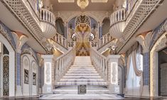 an elaborately decorated staircase leads up to the second floor