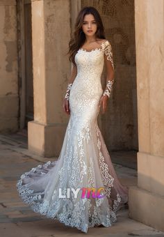 a woman in a white wedding dress posing for the camera