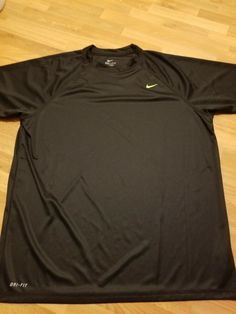 NIKE DRI FIT SHIRT MENS SIZE XLARGE BLACK Black Dri-fit Short Sleeve Top, Black Dri-fit Short Sleeve T-shirt, Nike Black Go-dry T-shirt, Nike Black Dri-fit T-shirt, Black Dri-fit T-shirt, Black Dri-fit Go-dry T-shirt, Black Dri-fit T-shirt With Go-dry Technology, Nike Swimwear, Nike Vintage