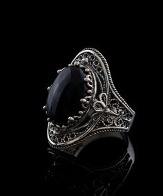 Black Onyx Silver Gothic Women Filigree Ring, 925 Sterling Silver Artisan Made Boho Floral Statement Ring, Goth Handmade Cocktail Ring Birthday gift ring, Black Onyx jewelry, oval statement ring, black cocktail ring, black gemstone ring, self control ring Gemstone: Black Onyx 10x14 mm. Material: 925 Sterling Silver ( NICKEL FREE ) A bold and beautiful statement ring, this Filigree Onyx Silver Victorian Floral Ring is stunning. The intricately woven floral design creates a feminine look with the Black Cocktail Ring, Gothic Women, The Ring Face, High Design, Jewelry Wedding Rings, Statement Ring Silver, Onyx Gemstone, Sterling Silver Filigree, Unique Beauty