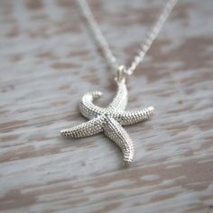 Starfish Pendant Necklace beautifully detailed in Sterling Silver, silver starfish, sea creatures, starfish necklace 🏖 Gorgeous sea creature works well on both a long chain and short, this is an incredibly eye-catching piece. Beautiful gift for someone special whether that's a best Friend, sister, girlfriend, wife or mother. Or you 🪸 🐚 Chain length in photo: 45cm / 17.7inch Starfish: 2.6cm / 1.0inch x 2.0cm / 0.78inch Beautifully detailed Sterling Silver starfish pendant necklace, silver star Ocean-inspired Silver Necklace With Star Charm, Silver Starfish Charm Jewelry, Starfish Jewelry, Starfish Pendant, Pendant Necklace Silver, Starfish Necklace, A Best Friend, Sea Creature, Metal Sheet