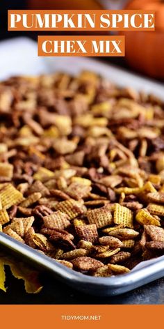 pumpkin spice chex mix in a baking pan with the title overlay reading, pumpkin spice chex mix