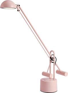 a pink desk lamp on a white background