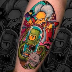 the simpsons tattoo is on someone's leg and it looks like they are in an old