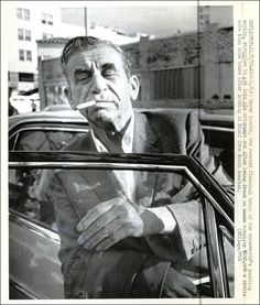 11/7/72-MIAMI, FLA: Meyer Lansky, the reputed financial brain of the underworld's gambling empire, struggles to get into his attorney's car after being freed on bond a little more than nine hours after landing in Miami from South America. (UPI)- Meyer Lansky, The Florida Keys