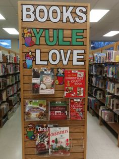 there is a sign that says books yule love on the wall in this store