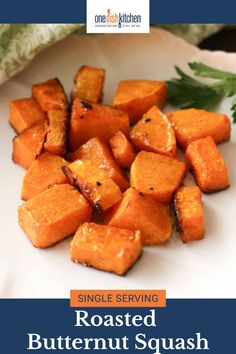 roasted butternut squash on a white plate with the title overlay reads, single serving roasted butternut squash