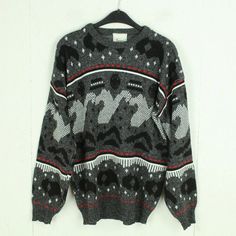 Brand: Vintage Product: Sweater Details: black and white, crazy pattern, 80s, 90s, round neck, knit Size men: L single chest width: 57 cm Arm length: 53 cm simple shoulder width: 62 cm Length: 69cm Condition: very good, used Material: 100% polyacrylic 14 day right of withdrawal | free store pick up in Berlin If you have any questions, please contact us by phone or email. We are happy to help you Monday to Saturday from 12:00 p.m. to 6:00 p.m. Please also note the dimensions as the sizes vary dep Winter Sweater With Graphic Print And Patterned Color, Winter Patterned Sweater With Graphic Print, Patterned Winter Sweater With Graphic Print, Patterned Sweater With Graphic Print For Winter, Retro Patterned Crew Neck Sweater, Black Crew Neck Sweater With Fair Isle Pattern, Black Vintage Sweater With Fair Isle Pattern, Vintage Black Sweater With Graphic Print, Retro Black Sweater With Fair Isle Pattern