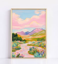 a painting hanging on the wall next to a white wall with a plant and flowers