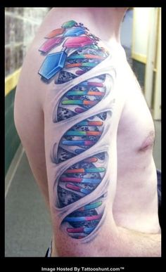 a man with a colorful tattoo on his arm