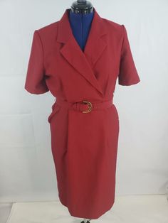 Sabino Womens Faux Wrap Dress Burgundy Red Pockets Notch Lapel Belted Vintage Petites 12P Vintage Sabino Petites faux wrap Burgundy red shirt dress, belt, shoulder pads, made in the USA, dress is not lined, has side pockets... All measurements are taken flat lay and approx; - Length from shoulder to hem; 43 Inches - Bust Round; 40 inches - Waist Round; 30 inches - Hips Round; 40 inches - Shoulder; 16 inches - From shoulder to waist; 16.5 inches - From waist to Hem; 26 inches Brand: Sabino Size: Retro Formal Dress In Solid Color, Formal Fitted Plain Dress, Plain Fitted Formal Dress, Red Belted Dress For Work, Classic Red Fall Dress, Classic Red Dress For Fall, Classic Red Dresses For Fall, Fitted Red Belted Dress, Red Fitted Belted Dress