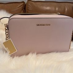 New With Tag! Beautiful Pink Color. Retail For $378 Michael Kors Blush Crossbody Bag, Michael Kors Blush Rectangular Bag, Michael Kors Blush Bags With Gold-tone Hardware, Michael Kors Blush Everyday Bag, Michael Kors Blush Bag For Everyday, Michael Kors Everyday Blush Bag, Blush Rectangular Bag With Branded Hardware, Blush Travel Bags With Branded Hardware, Blush Crossbody Bag