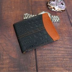 -This Bifold wallet is made of real premium leather that lasts and stands the test of time with great functionality. -It is unique, soft to touch, and double stitched for its durability. -RFID secured that prevents unauthorized scans of credit cards and personal information stored on RFID chips. -Stylish design with great functionality- It holds 10+ cards with 2 ID windows and a lot of cash. -Gift Box - Ideal for the most special gifts for your friends and family like Groomsmen, Birthdays, Anniversaries, Father's Day, Christmas and other Special Occasions. Black Leather Wallet As Gift, Leather Trifold Wallet For Father's Day, Brown Leather Trifold Wallet For Father's Day, Black Wallets With Card Slots For Father's Day, Father's Day Black Wallets With Card Slots, Leather Anniversary Gift, Leather Anniversary, Anniversary Gift For Him, Cash Gift